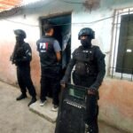 Operativos de la Policía de Investigaciones durante allanamientos realizados en distintos barrios de la ciudad de Santa Fe.