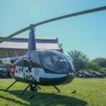 Helicóptero policial recientemente incorporado a la flota provincial, en tierra, listo para integrarse a los operativos de seguridad en Rosario.