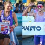 Magdalena Garrote e Ignacio Erario celebran su victoria tras consagrarse ganadores de la Media Maratón 21K de Santa Fe en el circuito de la Costanera.