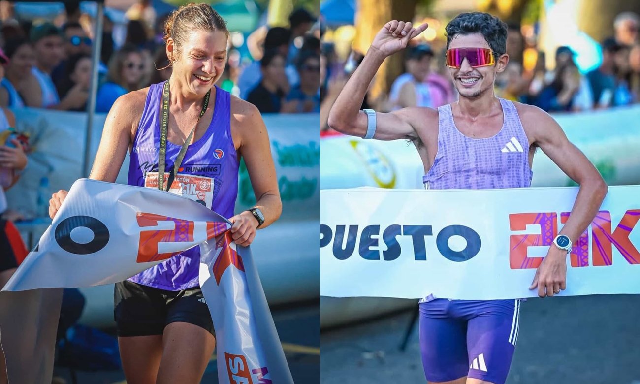 Magdalena Garrote e Ignacio Erario celebran su victoria tras consagrarse ganadores de la Media Maratón 21K de Santa Fe en el circuito de la Costanera.