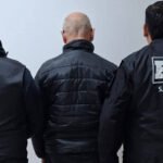 Personal de la Policía de Investigaciones durante un procedimiento vinculado a una causa por presuntas estafas virtuales. Foto de archivo.