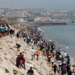 Miles de migrantes intentan ingresar al enclave español de Ceuta desde Marruecos durante una de las mayores crisis migratorias registradas en la frontera. Foto de archivo.