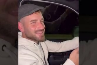 Captura del video difundido en redes sociales donde se observa al senador Oscar Dolzani conduciendo mientras utiliza un teléfono celular y sostiene un mate.