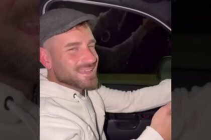 Captura del video difundido en redes sociales donde se observa al senador Oscar Dolzani conduciendo mientras utiliza un teléfono celular y sostiene un mate.