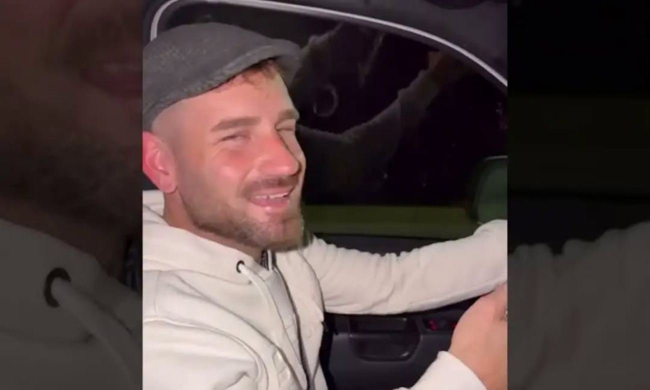 Captura del video difundido en redes sociales donde se observa al senador Oscar Dolzani conduciendo mientras utiliza un teléfono celular y sostiene un mate.