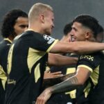 Enzo Fernández y Erling Haaland, protagonistas de un festejo con la camiseta del Manchester City.